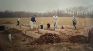 Families building garden beds